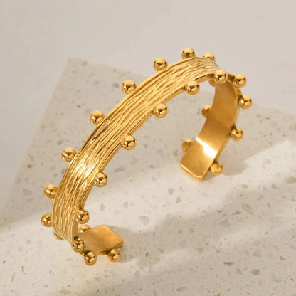 Regal Crest Cuff Bangle