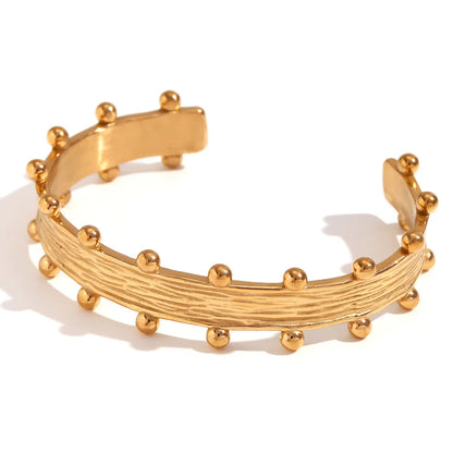 Regal Crest Cuff Bangle