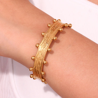 Regal Crest Cuff Bangle