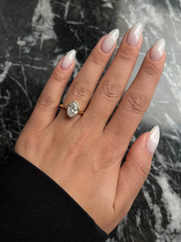 Bezel Oval Solitaire Ring